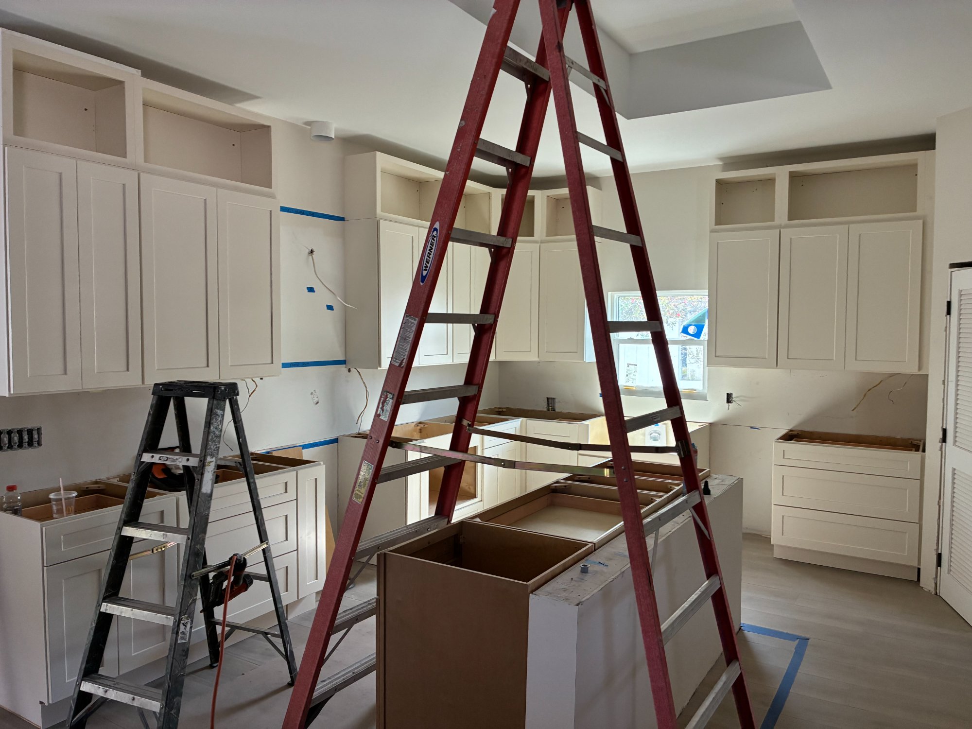 Full kitchen RTA cabinet installation in progress